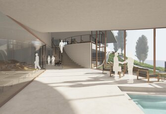 Eine helle Lounge mit Treppe, Sitzgruppe und Blick zum Poolbereich im Hotel Hochschober.