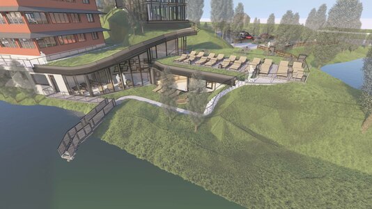 A modern building with large windows overlooks a grassy area by a river. A patio with lounge chairs is visible, along with a winding pathway leading to the water. Trees surround the setting, creating a tranquil atmosphere.