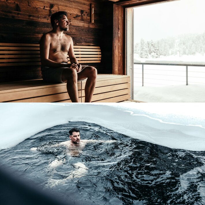 A man sits in a wooden sauna and looks out through the window at the snowy lakeside landscape.