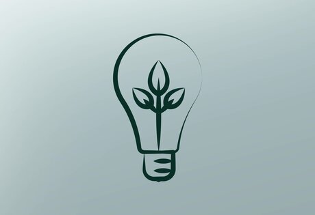 A stylized light bulb with a leaf motif stands on a light background and symbolizes energy saving.